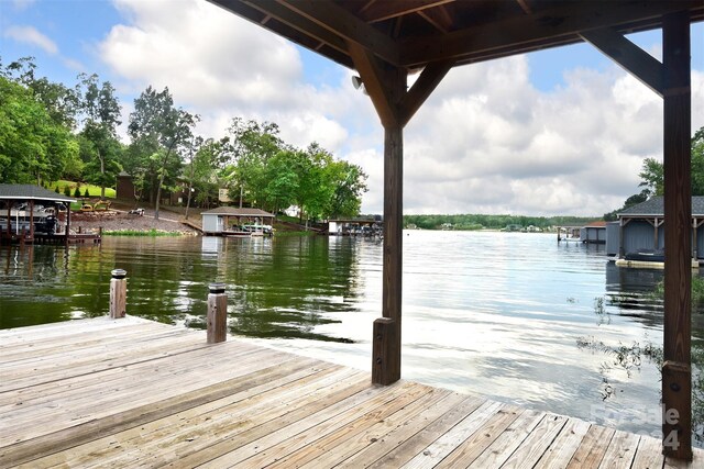 dock area featuring a water view