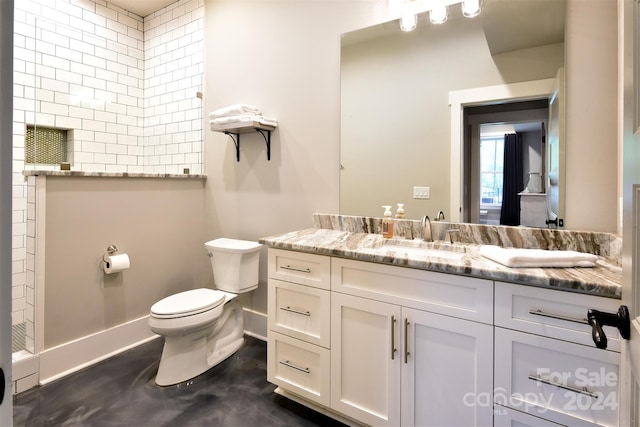 full bath featuring toilet, baseboards, and vanity