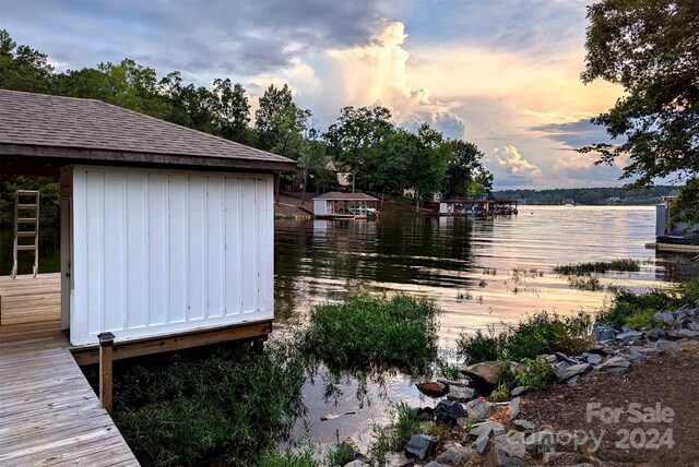 dock area featuring a water view