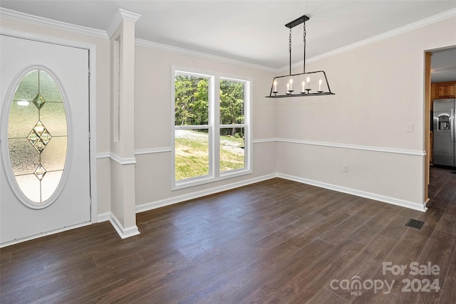 interior space featuring ornamental molding, dark wood-style flooring, and baseboards