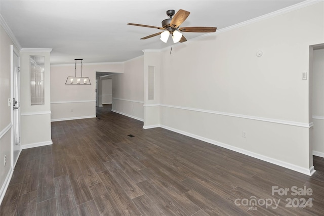 unfurnished living room featuring crown molding, dark wood finished floors, baseboards, and ceiling fan with notable chandelier