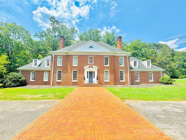 view of front of home with a front yard