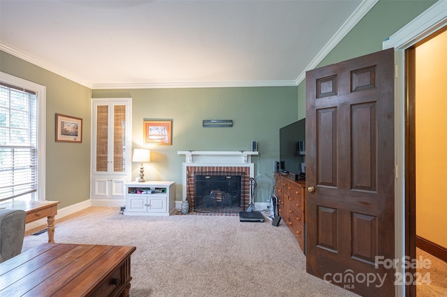 carpeted living room featuring ornamental molding and a fireplace