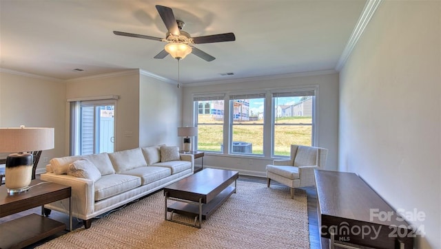 living room with ceiling fan, crown molding, and hardwood / wood-style floors