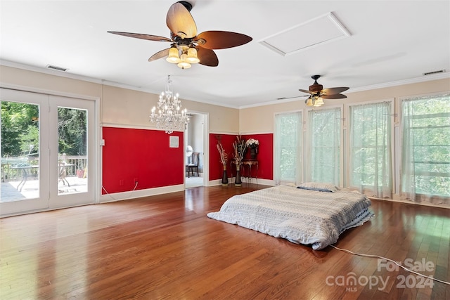 bedroom with ceiling fan, multiple windows, and access to outside