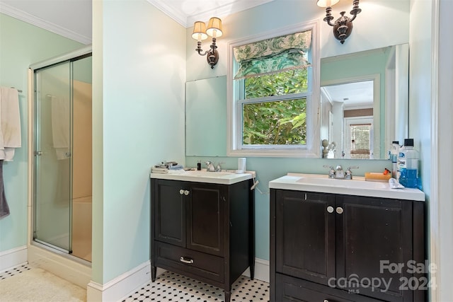 bathroom featuring crown molding, a shower with door, and vanity