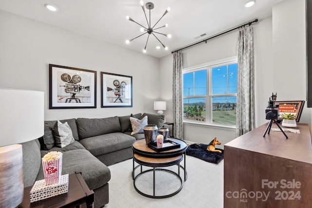 living room featuring a notable chandelier