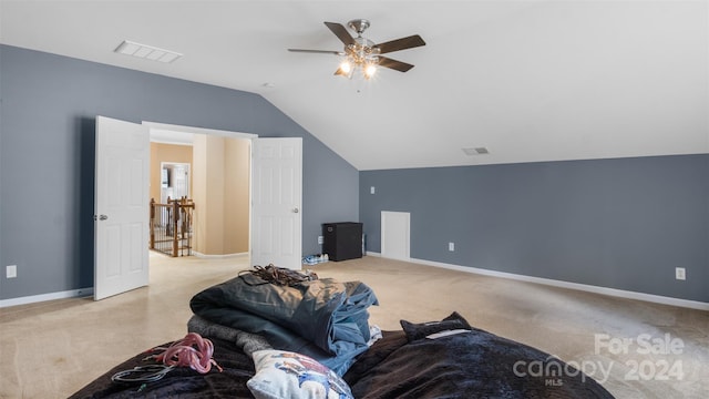 additional living space featuring light carpet, vaulted ceiling, and ceiling fan