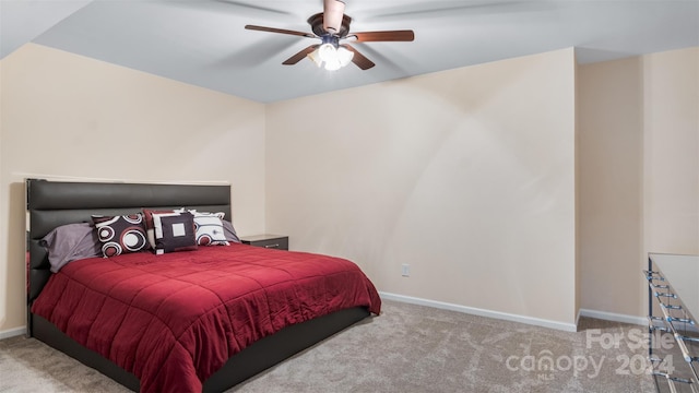 bedroom with light colored carpet and ceiling fan