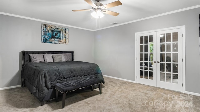 carpeted bedroom with ornamental molding, french doors, and ceiling fan