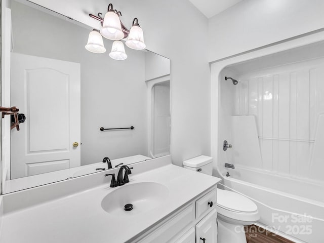 full bathroom featuring shower / bathtub combination, toilet, and vanity