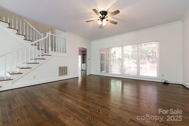 unfurnished living room featuring ceiling fan, ornamental molding, and dark hardwood / wood-style flooring