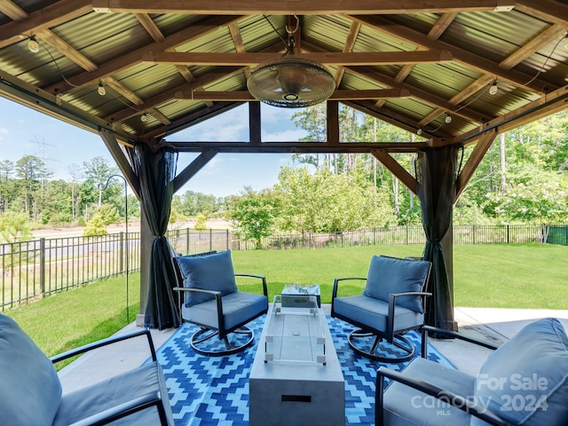 view of patio with ceiling fan and a gazebo