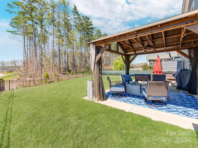 view of yard featuring a gazebo and a patio