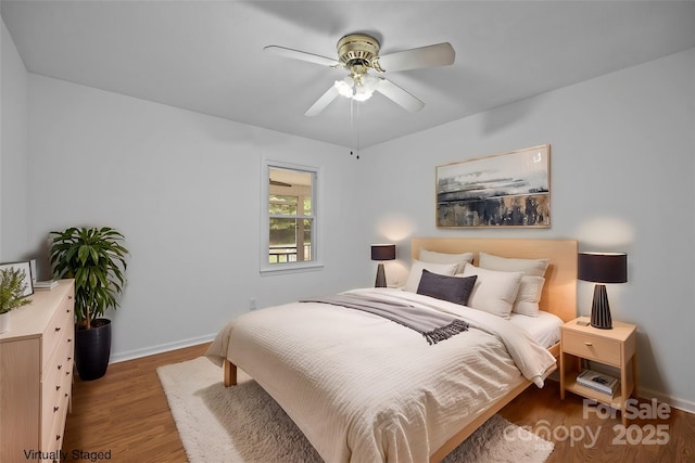 bedroom featuring ceiling fan and light wood-type flooring