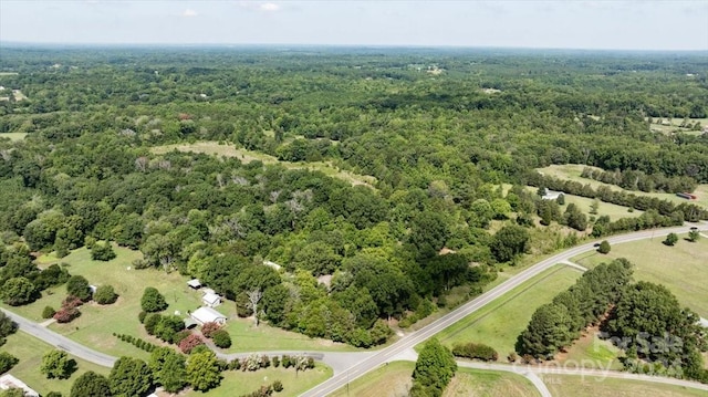 bird's eye view featuring a view of trees