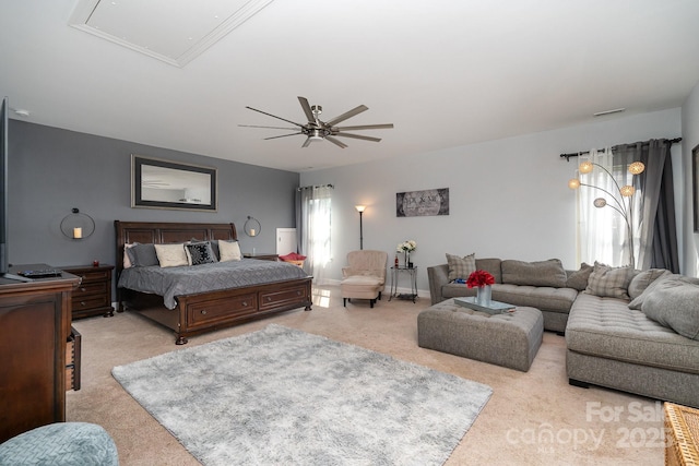 carpeted bedroom with ceiling fan