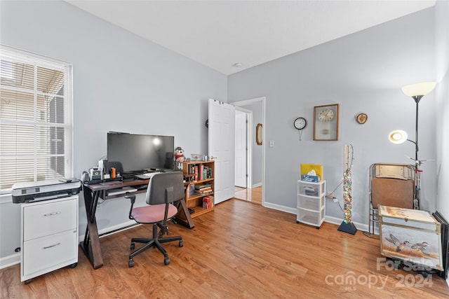 office area with light wood-type flooring