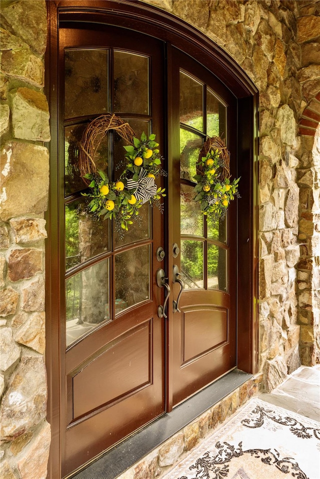 doorway to property featuring french doors