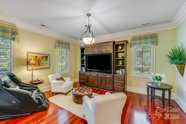 living room with dark hardwood / wood-style flooring and ornamental molding