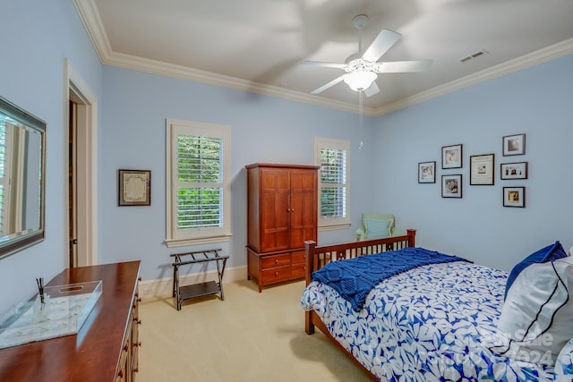 bedroom featuring ornamental molding, light colored carpet, visible vents, and baseboards