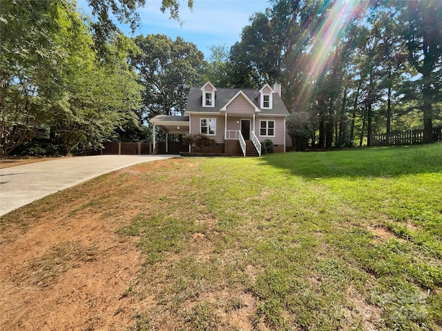 view of front of property featuring a front yard and a carport