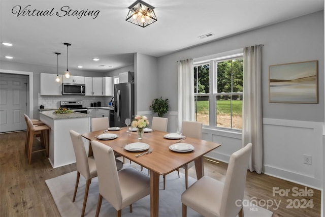 dining room featuring hardwood / wood-style floors