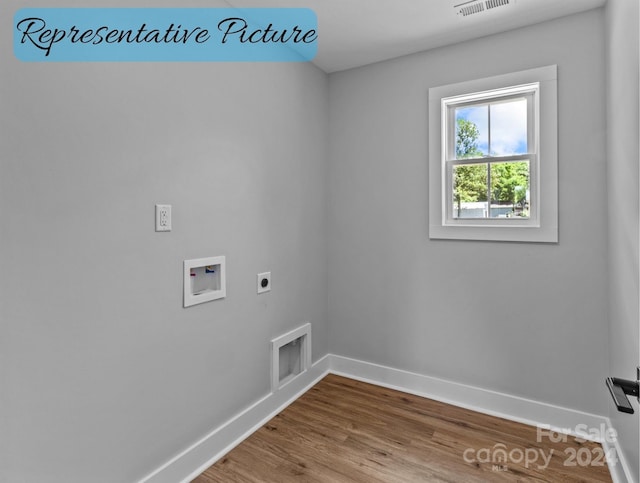 laundry area with hardwood / wood-style flooring, hookup for a washing machine, and electric dryer hookup