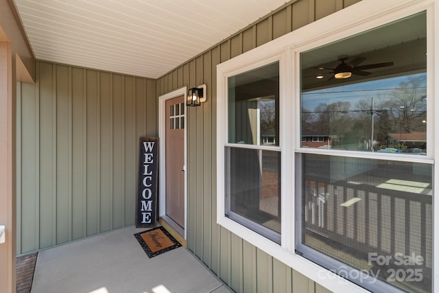 view of exterior entry featuring a porch