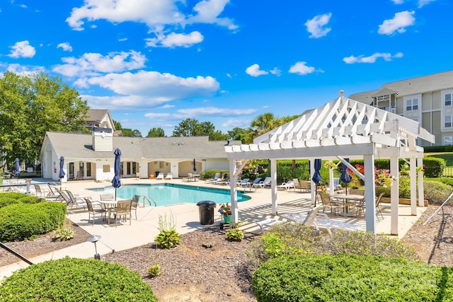 view of pool featuring a pergola and a patio