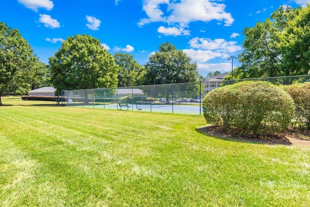 view of yard featuring tennis court