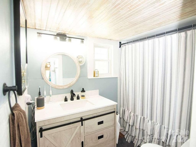 bathroom featuring wood ceiling, vanity, toilet, and a shower with curtain