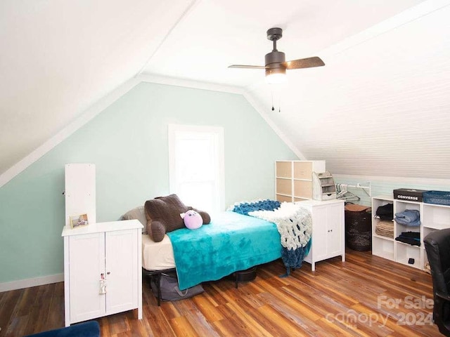 bedroom featuring wood-type flooring, lofted ceiling, and ceiling fan