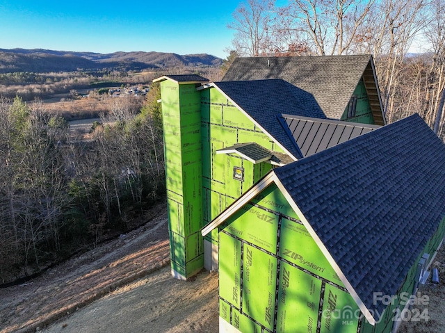 exterior space featuring a mountain view