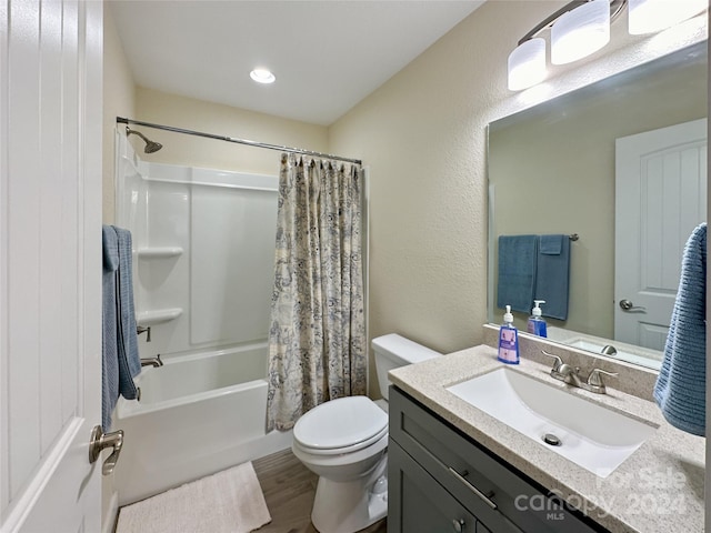 full bathroom with toilet, vanity, shower / bath combo, and hardwood / wood-style flooring