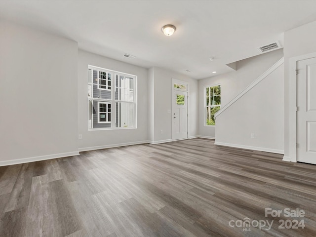 interior space with hardwood / wood-style floors