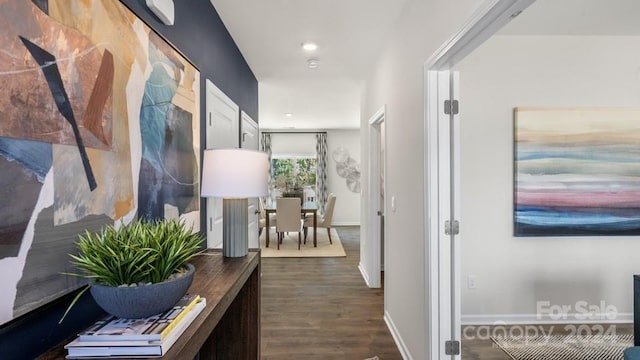 hall featuring dark wood-type flooring