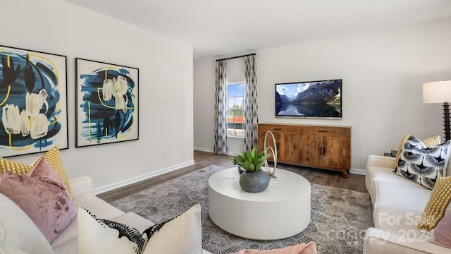 living room with dark hardwood / wood-style flooring