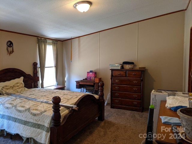 carpeted bedroom with ornamental molding