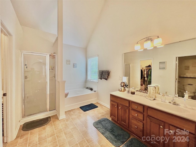 bathroom with shower with separate bathtub, tile patterned floors, high vaulted ceiling, and dual bowl vanity