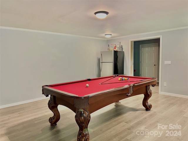 game room with ornamental molding, light hardwood / wood-style floors, and billiards