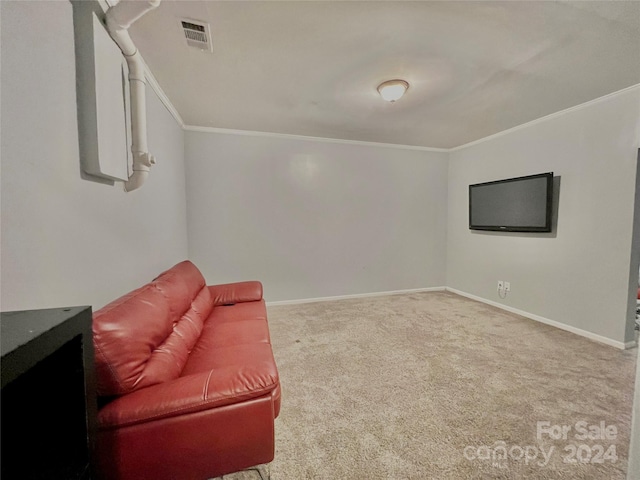 carpeted living room with crown molding