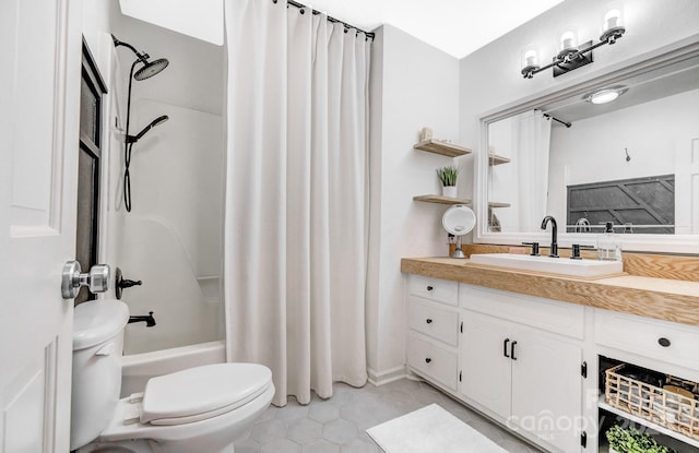 full bathroom featuring toilet, tile patterned flooring, shower / bath combination with curtain, and vanity