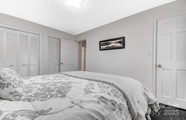 bedroom featuring two closets