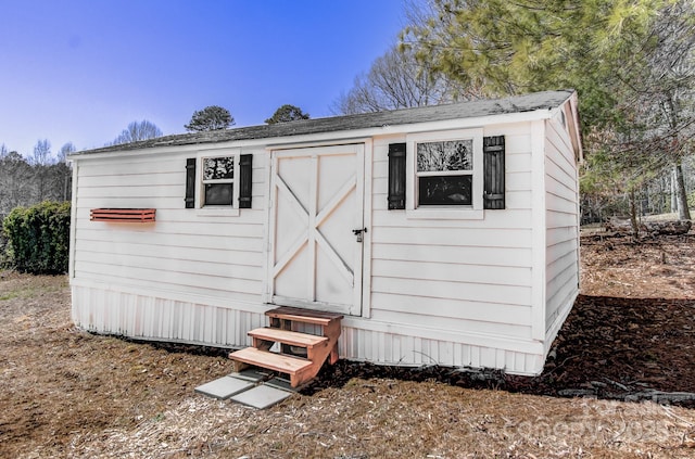 view of outbuilding featuring entry steps