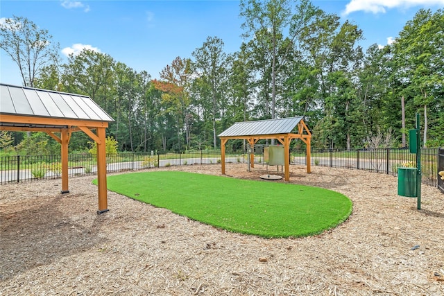 view of playground featuring a gazebo and a yard