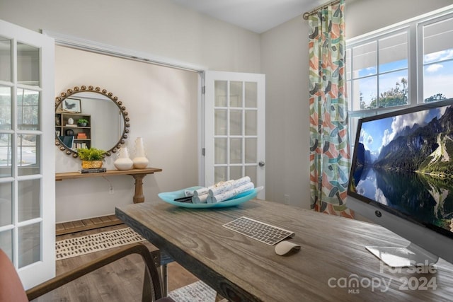 office area with french doors and wood-type flooring