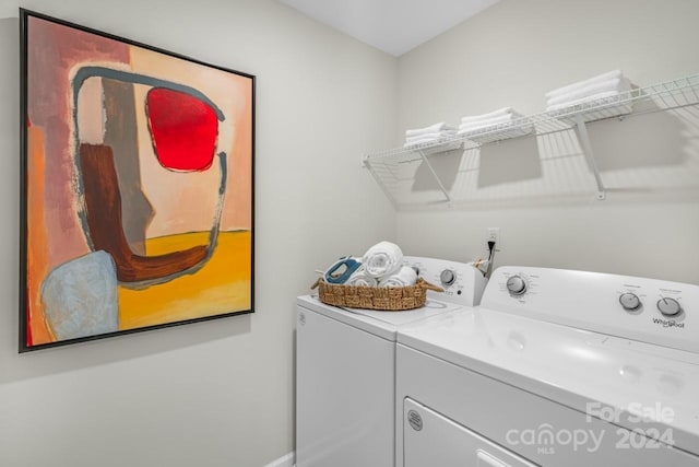 laundry room featuring washer and clothes dryer