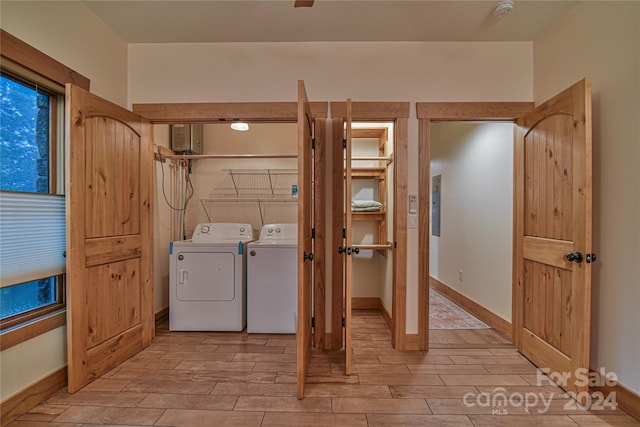 washroom featuring washer and dryer and electric panel