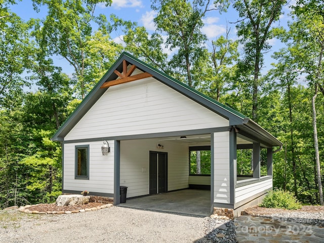 exterior space featuring a carport